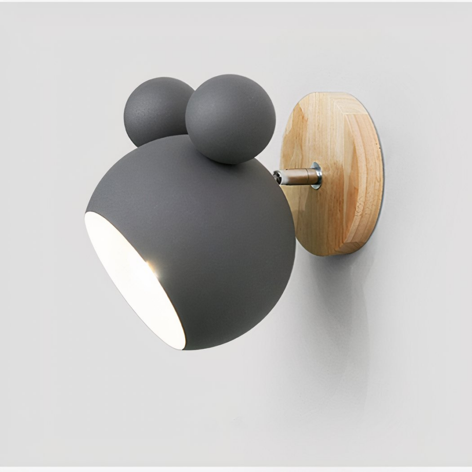Aplique infantil gris con diseño de Mickey en metal sobre fondo gris