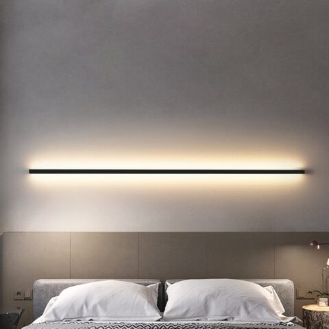 Aplique cabecero LED negro, gran barra rectangular sobre una cama