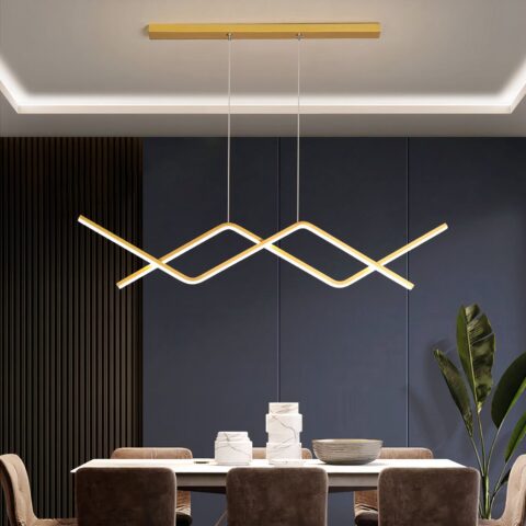 Colgante de cocina LED de diseño con soporte dorado en un comedor