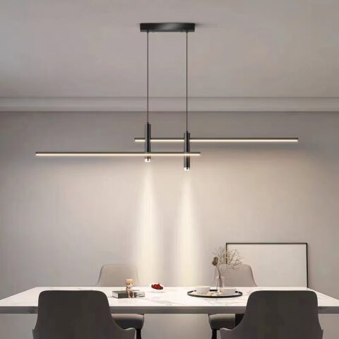 Colgante LED multifuncional de diseño moderno y minimalista sobre una mesa de comedor
