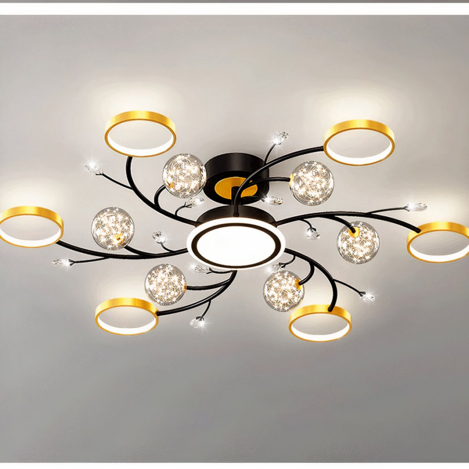 Araña circular con anillos negros y dorados y bolas de cristal