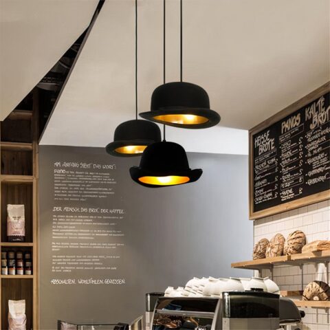 Moderno colgante LED negro en forma de sombrero de melón en la cocina