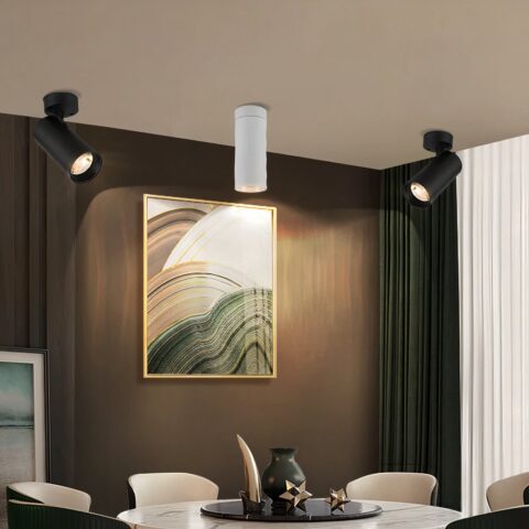 Foco de techo LED negro salón moderno, instalado en el techo de un comedor en versión blanca.